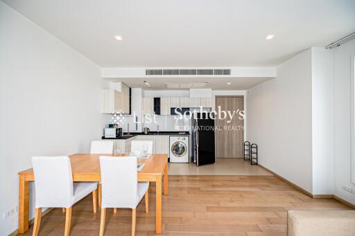 Modern dining area and kitchen with wooden flooring