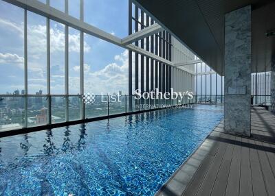 Modern building rooftop pool with city view