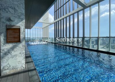 Indoor swimming pool with city view