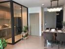 Modern dining area with adjoining kitchen