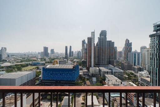 View from balcony overlooking city skyline