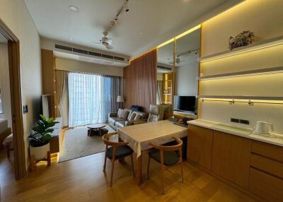 Modern living room with dining area and natural lighting