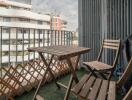 Cozy balcony with wooden table and chairs