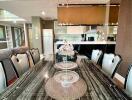 Dining room with a chandelier and a black marble dining table