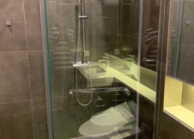 Modern bathroom with glass shower enclosure