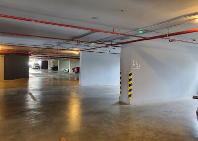 Indoor parking space with several cars