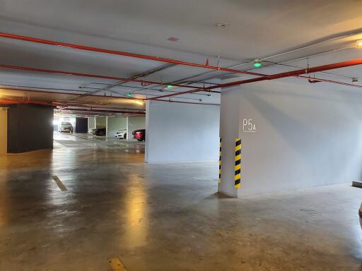 Indoor parking space with several cars