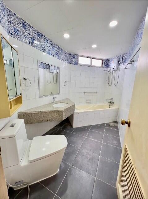 Spacious bathroom with modern fixtures