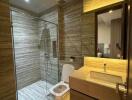 Modern bathroom with glass-enclosed shower and wooden vanity