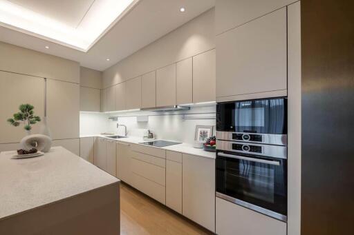 Modern kitchen with built-in appliances and island