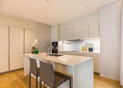 Modern kitchen with island and bar stools