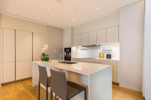 Modern kitchen with island and bar stools