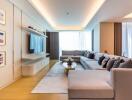 Modern living room with large sectional sofa and wall-mounted TV