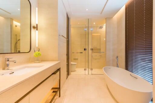 Modern bathroom with a large bathtub and shower