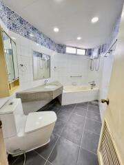 Modern bathroom with bathtub and toilet