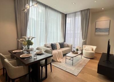 Modern living and dining area with natural light