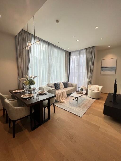 Modern living and dining area with natural light