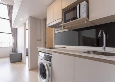 Modern kitchen area with appliances