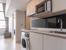 Modern kitchen area with appliances