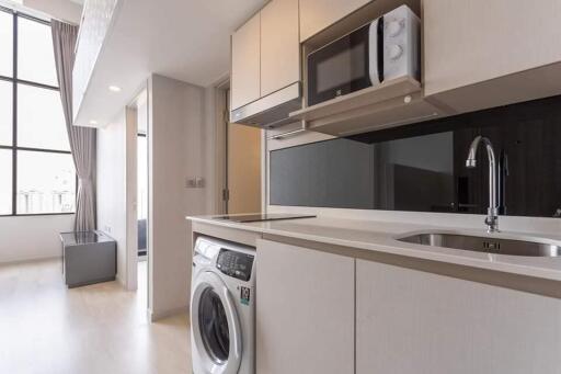 Modern kitchen area with appliances