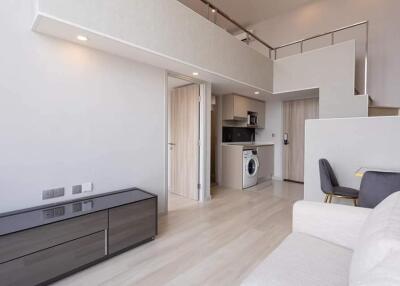 Modern duplex apartment with loft area and built-in kitchen