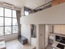 Living room with mezzanine, large windows, and city view