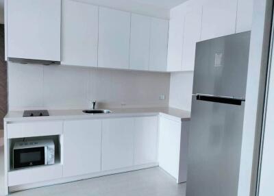 Modern white kitchen with appliances