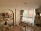 Decorative bedroom with desk, shelves, and window