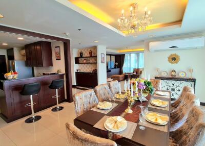 Spacious open-concept living and dining area with modern amenities