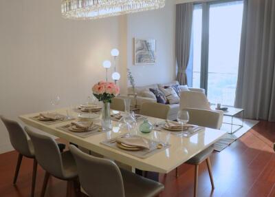 Modern dining area adjoined with a cozy living space