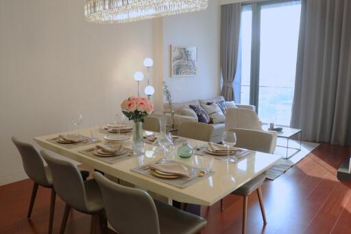 Modern dining area adjoined with a cozy living space