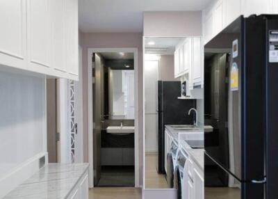 Modern white kitchen with appliances