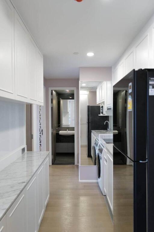 Modern white kitchen with appliances