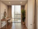 A well-lit bedroom with a modern vanity setup and indoor plant