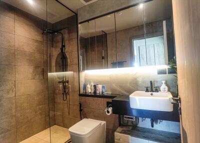 Modern bathroom with glass shower and sink