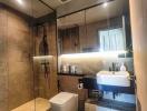 Modern bathroom with glass shower and sink