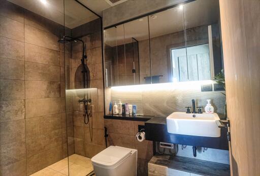 Modern bathroom with glass shower and sink