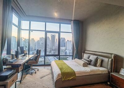 Modern bedroom with a city view