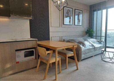 Modern living and dining area with natural light