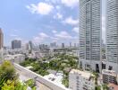 Cityscape view from high-rise balcony