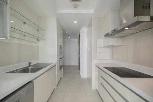 Modern white kitchen with built-in appliances