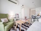 Cozy living room with green armchair, wooden coffee table, and modern decor