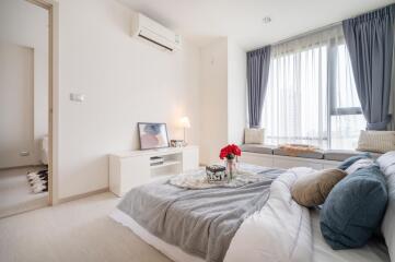 Cozy and well-decorated bedroom with natural light