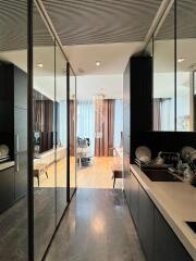 Modern kitchen leading to a living space