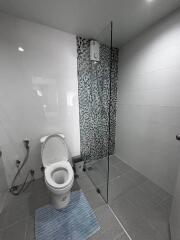 Modern bathroom with a shower and toilet