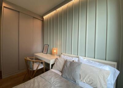 Modern bedroom with built-in wardrobes and desk