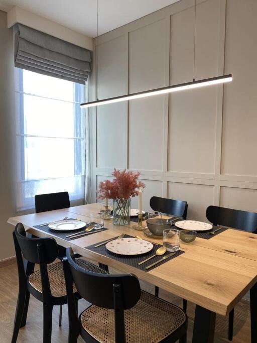 Modern dining area with a set table