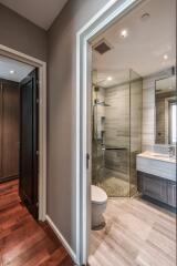 Modern bathroom with glass shower door and vanity