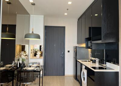 Modern kitchen area with dining space