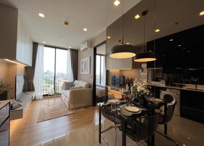 Modern living room with dining area and kitchen